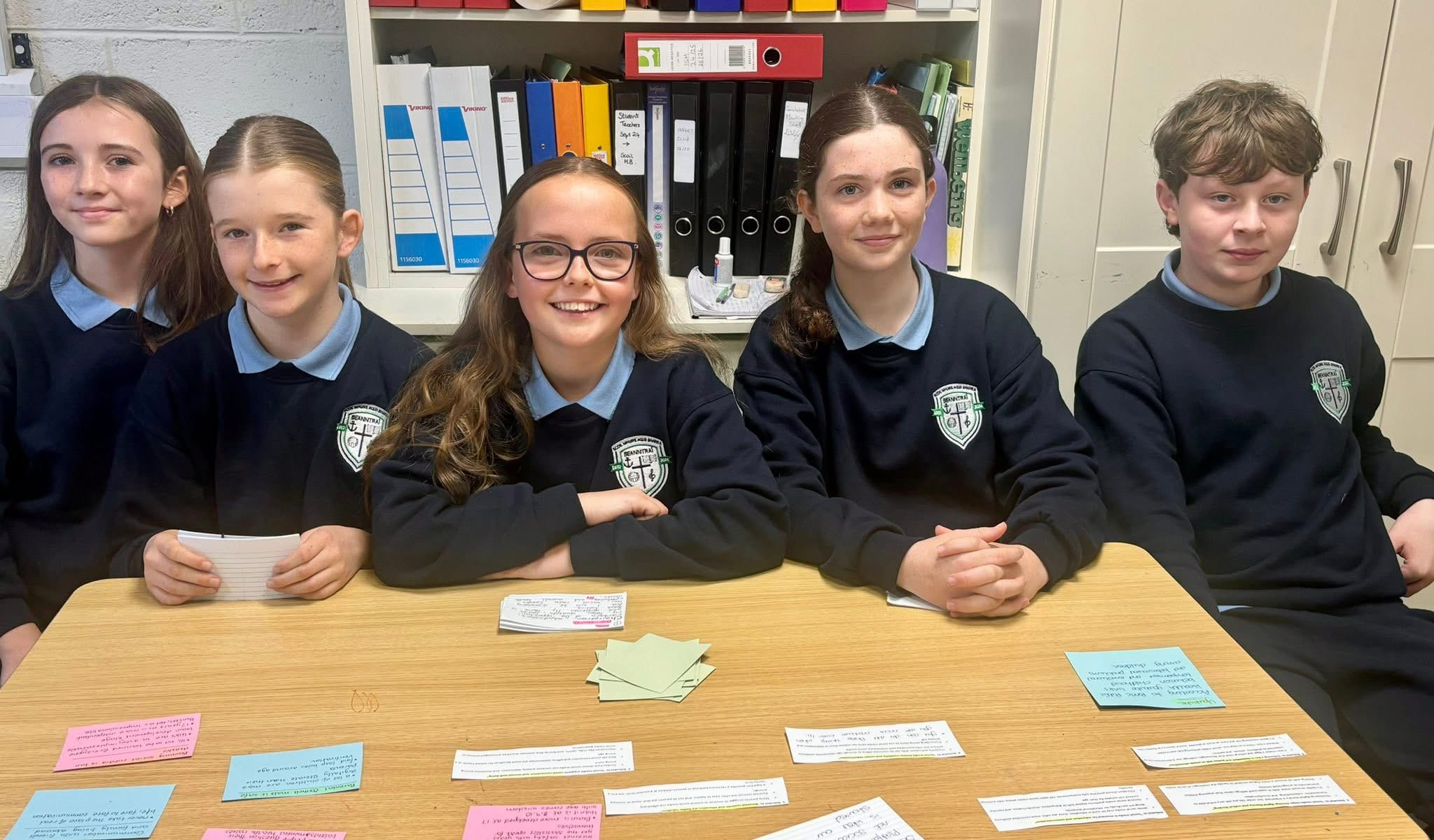 Pupils preparing their notes for a school debate